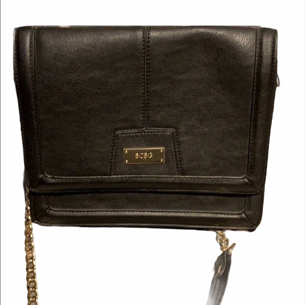 BCBG Black leather purse with gold chain strap.